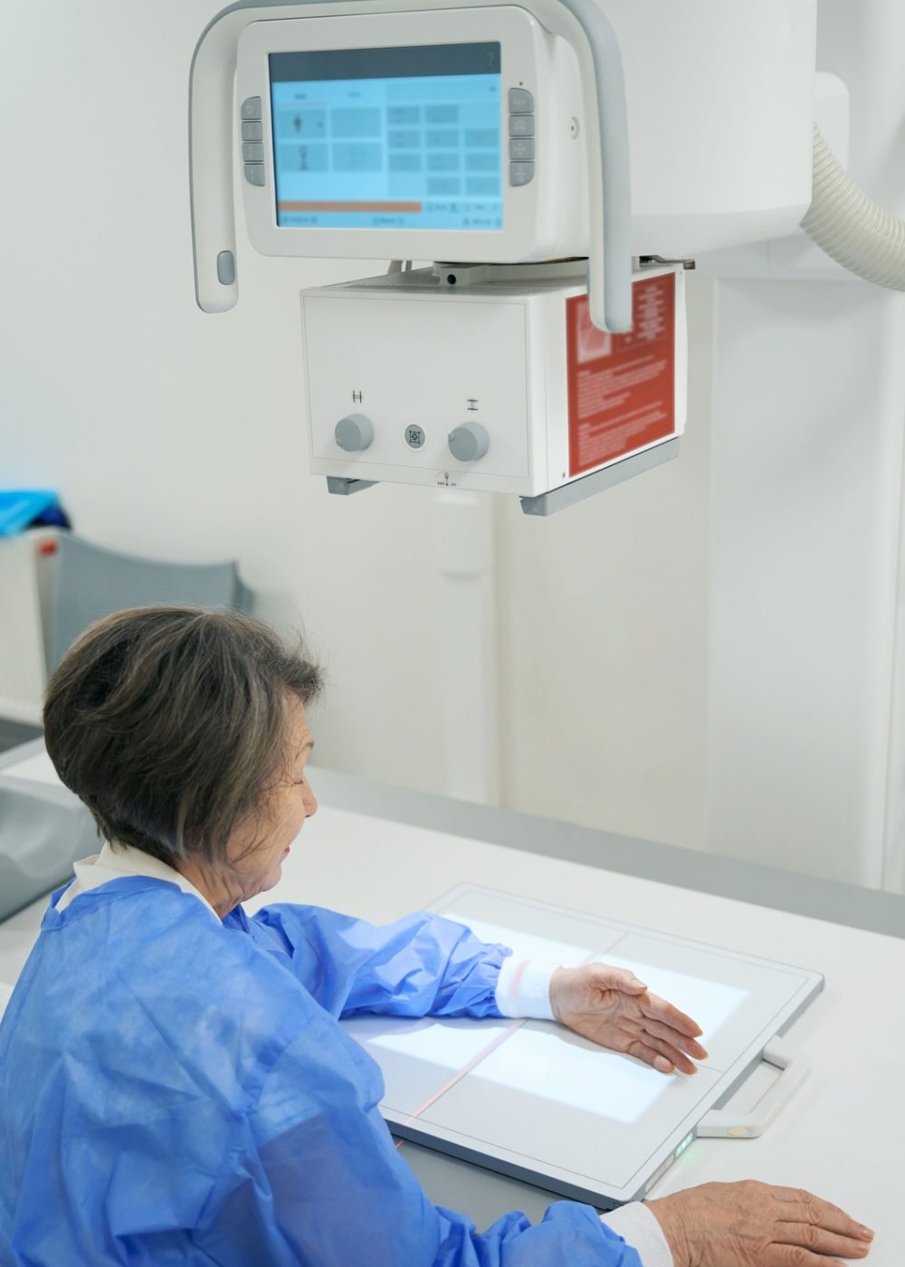 elderly-woman-is-sitting-in-the-x-ray-room-2023-02-02-01-41-57-utc